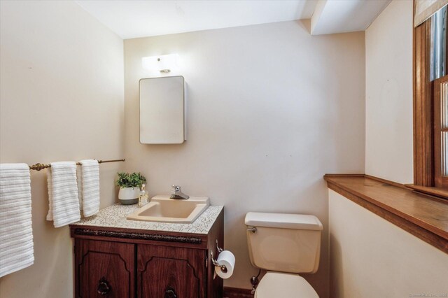 128 Carriage Dr, Avon, CT 06001 - half bathroom featuring vanity and toilet