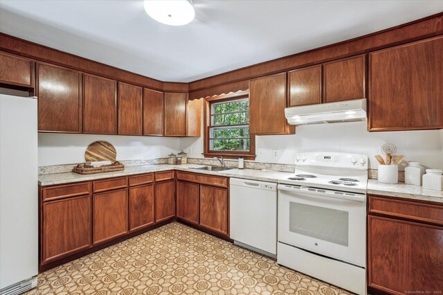 128 Carriage Dr, Avon, CT 06001 - kitchen featuring white appliances, under cabinet range hood, and light countertops