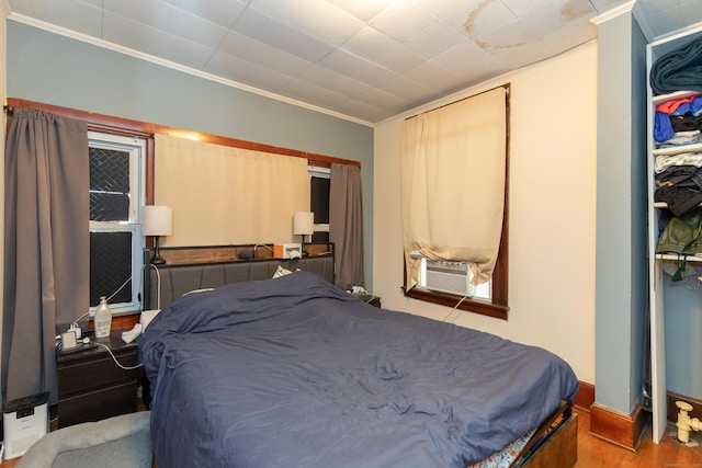 213 Easton Ave, Waterbury, CT 06704 - bedroom featuring crown molding and wood finished floors