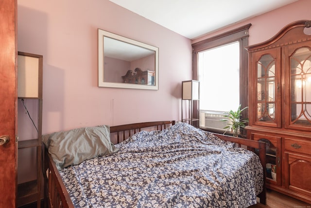 213 Easton Ave, Waterbury, CT 06704 - bedroom featuring wood finished floors and cooling unit