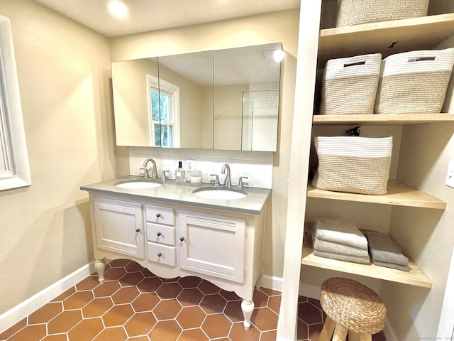 47 Chestnut Hill Rd, East Hampton, CT 06424 - bathroom with double vanity and tile patterned floors