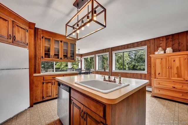 412 Goshen Rd, Litchfield, CT 06759 - kitchen with freestanding refrigerator, stainless steel dishwasher, light flooring, light countertops, and wooden walls