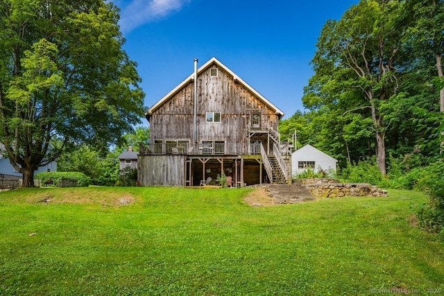 412 Goshen Rd, Litchfield, CT 06759 - rear view of house featuring stairway, a lawn, and a wooden deck