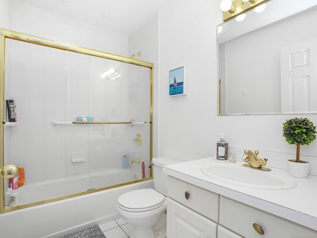 465 Edward St, Fairfield, CT 06824 - bathroom featuring vanity, tile patterned flooring, and bath / shower combo with glass door