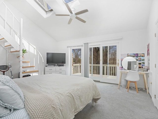 465 Edward St, Fairfield, CT 06824 - bedroom with access to exterior, carpet, vaulted ceiling, a skylight, and a ceiling fan