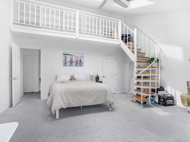 465 Edward St, Fairfield, CT 06824 - bedroom with carpet, a high ceiling, a skylight, and ceiling fan