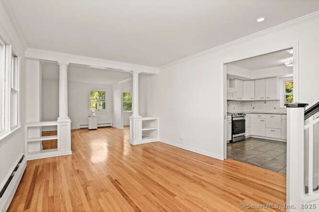 465 Edward St, Fairfield, CT 06824 - unfurnished living room featuring a baseboard radiator, light wood-style floors, ornate columns, crown molding, and recessed lighting