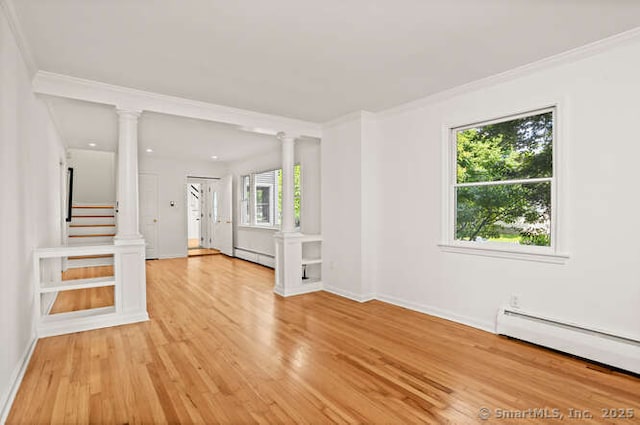 465 Edward St, Fairfield, CT 06824 - unfurnished living room with ornate columns, light wood finished floors, ornamental molding, baseboard heating, and stairway