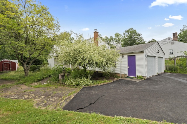 905 Meriden Ave, Southington, CT 06489 - view of yard with a detached garage and a storage unit