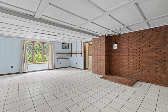 905 Meriden Ave, Southington, CT 06489 - unfurnished room featuring brick wall, coffered ceiling, and light tile patterned floors
