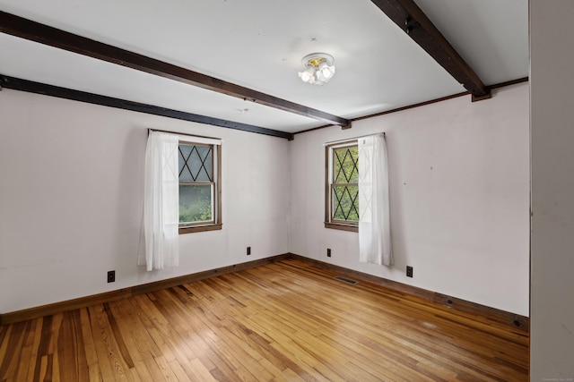 905 Meriden Ave, Southington, CT 06489 - spare room with beamed ceiling and light wood-style flooring