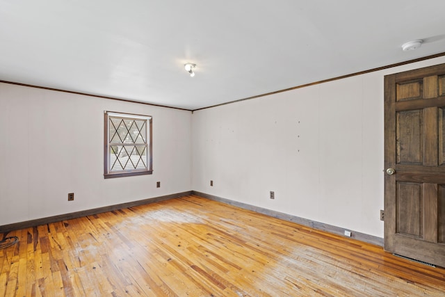 905 Meriden Ave, Southington, CT 06489 - unfurnished room with ornamental molding, light wood-style flooring, and a smoke detector