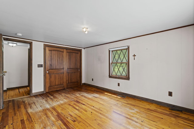 905 Meriden Ave, Southington, CT 06489 - unfurnished bedroom featuring hardwood / wood-style floors and ornamental molding