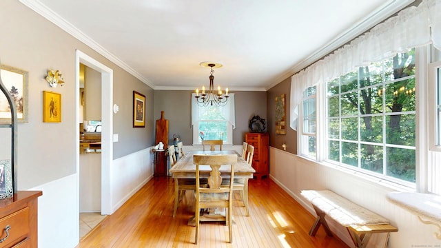 3 Lower Lake Rd, Danbury, CT 06811 - dining space featuring a chandelier, light wood-style floors, ornamental molding, and wainscoting