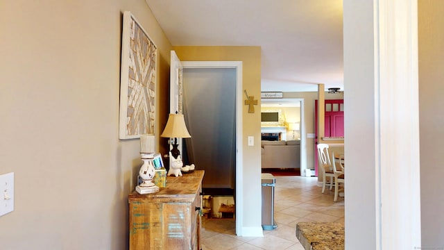 3 Lower Lake Rd, Danbury, CT 06811 - hallway featuring light tile patterned flooring and baseboards