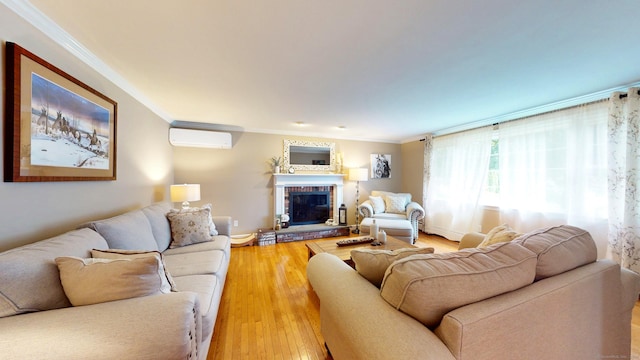 3 Lower Lake Rd, Danbury, CT 06811 - living room featuring crown molding, an AC wall unit, a fireplace, and light wood-type flooring