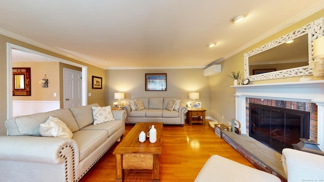 3 Lower Lake Rd, Danbury, CT 06811 - living area featuring wood finished floors, ornamental molding, a wall unit AC, and a brick fireplace