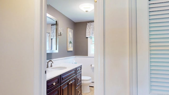 3 Lower Lake Rd, Danbury, CT 06811 - bathroom featuring vanity, a wainscoted wall, and baseboard heating