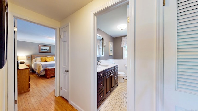 3 Lower Lake Rd, Danbury, CT 06811 - hallway featuring a sink and light wood-style floors