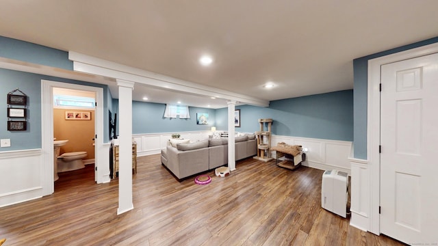 3 Lower Lake Rd, Danbury, CT 06811 - living room featuring a wainscoted wall, wood finished floors, a decorative wall, and recessed lighting