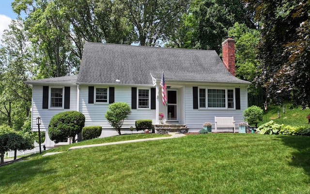 3 Lower Lake Rd, Danbury, CT 06811 - view of front of house featuring a chimney and a front lawn