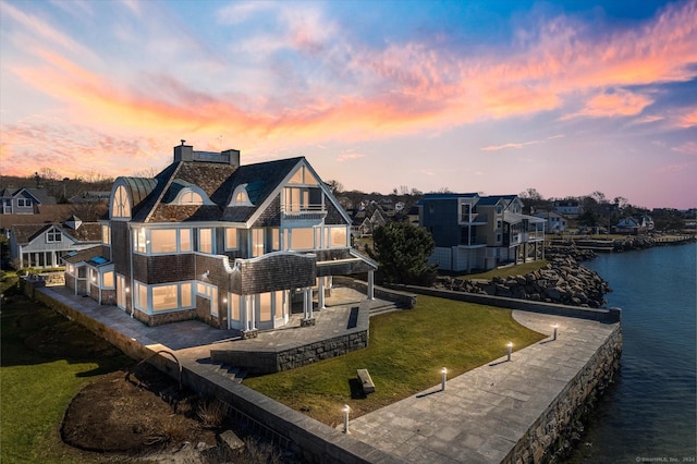 33 Palmer Rd, Waterford, CT 06385 - rear view of house with a patio area, a water view, a chimney, a yard, and a balcony