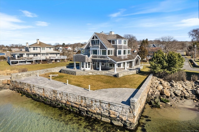 33 Palmer Rd, Waterford, CT 06385 - rear view of house featuring a chimney, a patio, a yard, and a deck