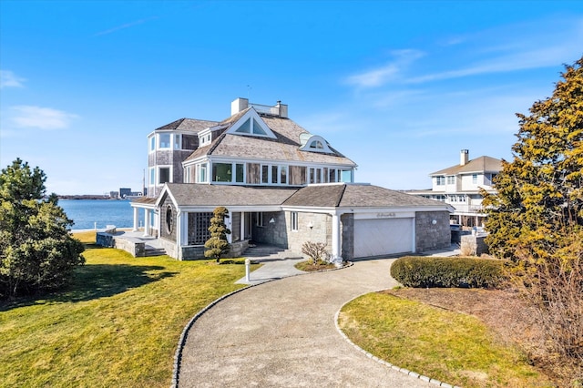 33 Palmer Rd, Waterford, CT 06385 - shingle-style home with a porch, a front yard, a chimney, driveway, and a water view