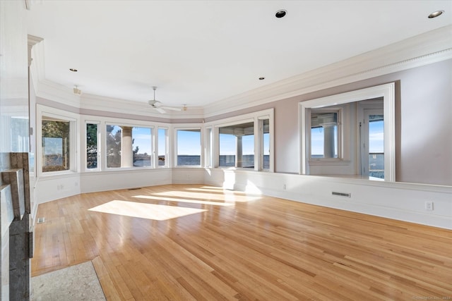 33 Palmer Rd, Waterford, CT 06385 - unfurnished room with crown molding, wood-type flooring, ceiling fan, and a water view
