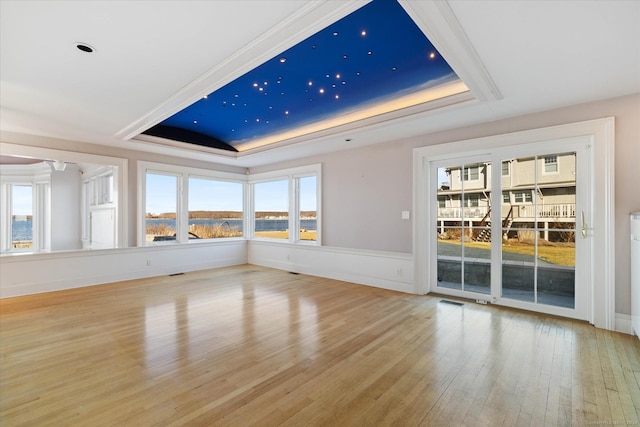 33 Palmer Rd, Waterford, CT 06385 - spare room featuring a raised ceiling and wood finished floors