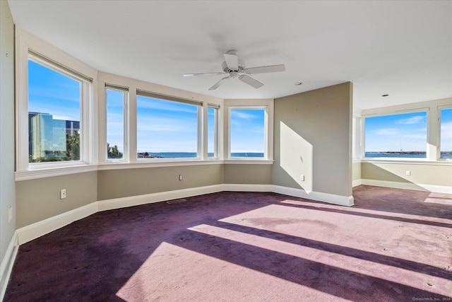 33 Palmer Rd, Waterford, CT 06385 - carpeted spare room with plenty of natural light and a ceiling fan