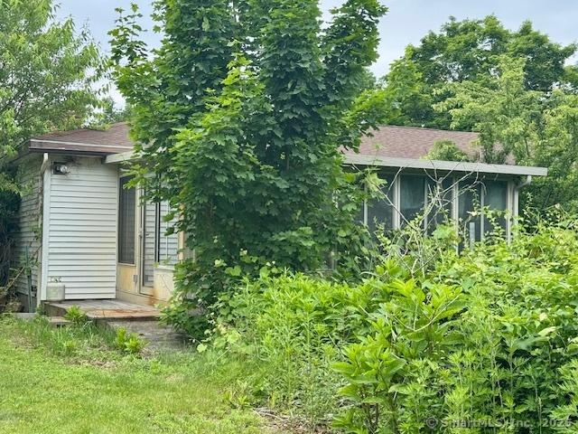 77 Plains Rd, Windham, CT 06280 - back of house featuring a shingled roof