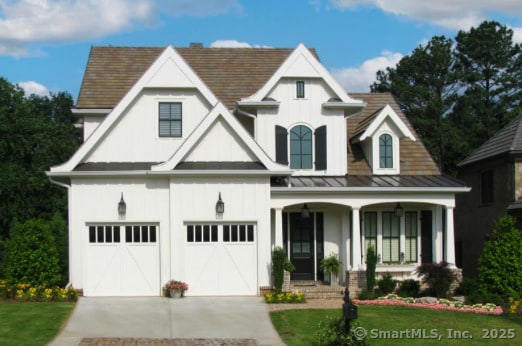 745 Townsend Ave Lot 7, New Haven, CT 06512 - view of front of property with covered porch, driveway, a standing seam roof, a metal roof, and board and batten siding