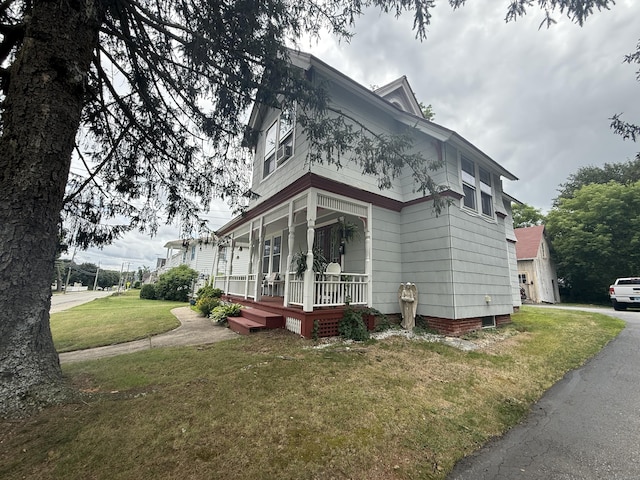352 Church St, Putnam, CT 06260 - view of side of property with a porch and a lawn