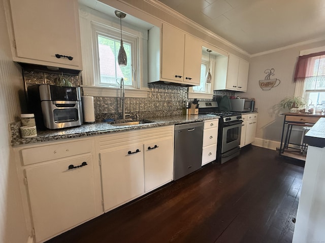 352 Church St, Putnam, CT 06260 - kitchen featuring stainless steel appliances, crown molding, dark wood finished floors, tasteful backsplash, and white cabinets