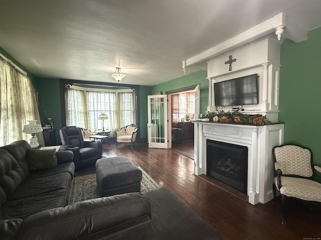 352 Church St, Putnam, CT 06260 - living room with dark wood-style floors and a fireplace