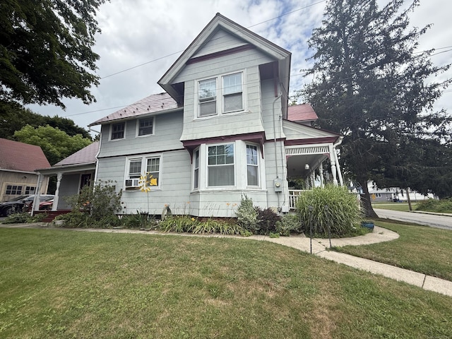 352 Church St, Putnam, CT 06260 - view of front of home with a front yard and covered porch