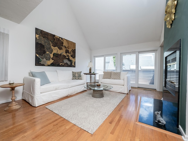26 Wilton Crst Unit 26, Wilton, CT 06897 - living room with high vaulted ceiling and wood finished floors
