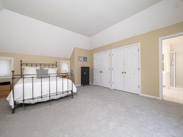 26 Wilton Crst Unit 26, Wilton, CT 06897 - bedroom featuring carpet, lofted ceiling, multiple closets, and ensuite bathroom