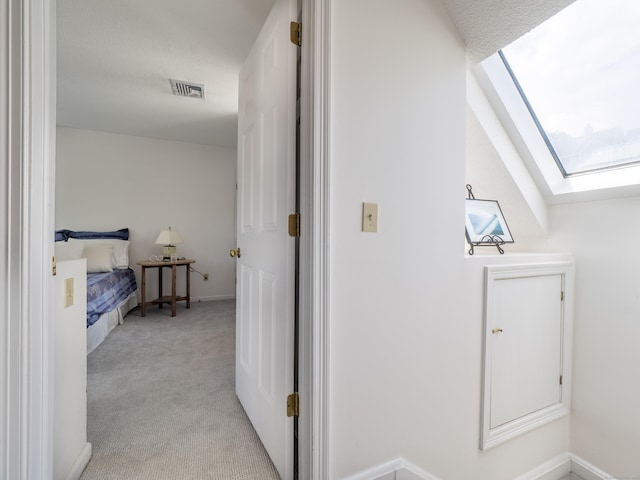 26 Wilton Crst Unit 26, Wilton, CT 06897 - hall featuring a skylight and light carpet