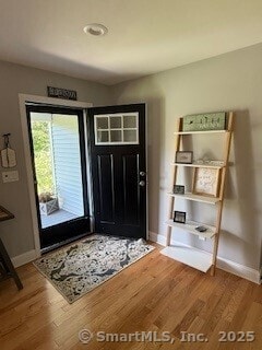 1 Brookfield Rd, Harwinton, CT 06791 - foyer with light wood-style floors and baseboards