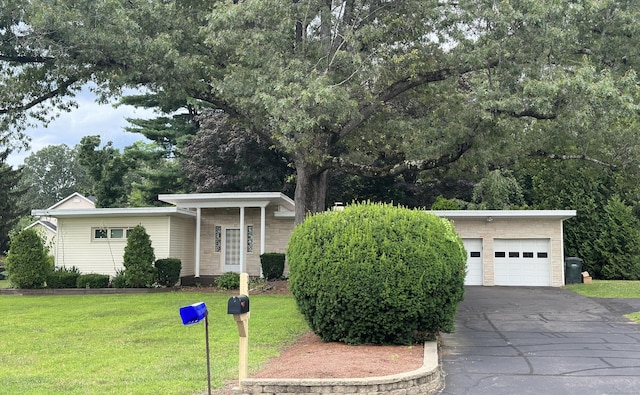 23 S Elm St, Windsor Locks, CT 06096 - view of front of home with a front yard and a garage