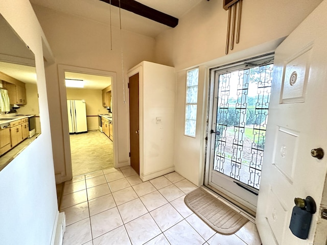 23 S Elm St, Windsor Locks, CT 06096 - entryway featuring light tile patterned flooring and beam ceiling