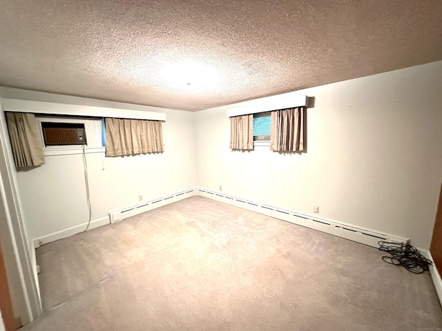 23 S Elm St, Windsor Locks, CT 06096 - basement featuring light carpet, a textured ceiling, and a wall mounted air conditioner