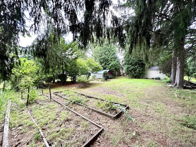 23 S Elm St, Windsor Locks, CT 06096 - view of green lawn with a garden and an outdoor structure