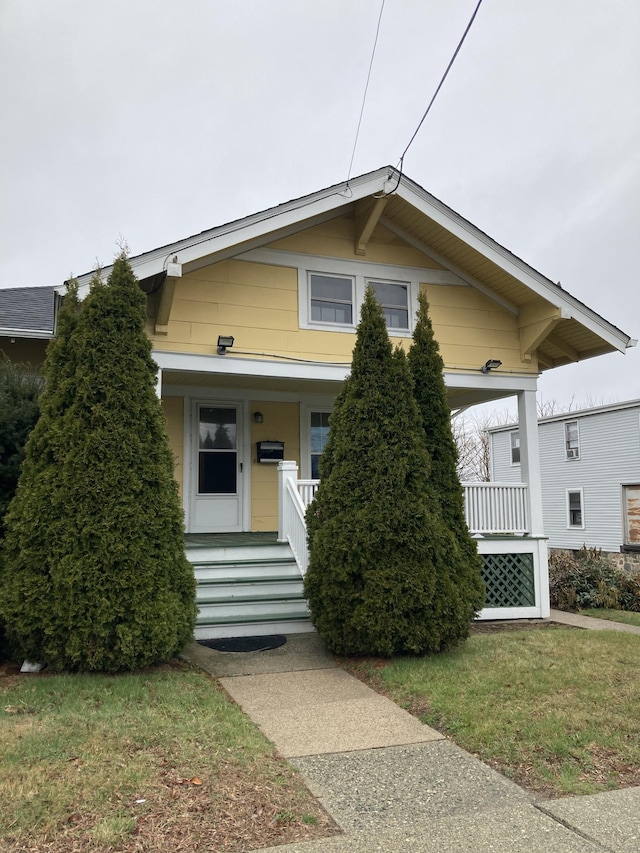 21 Chicago Ave, Groton, CT 06340 - view of front of property with covered porch