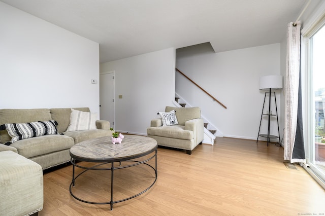 95 Elm St Apt 4, West Haven, CT 06516 - living room with light wood-type flooring and stairs