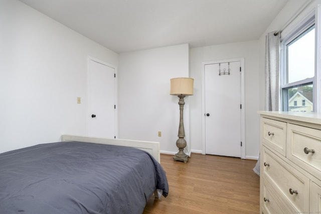 95 Elm St Apt 4, West Haven, CT 06516 - bedroom featuring light wood-style floors and baseboards