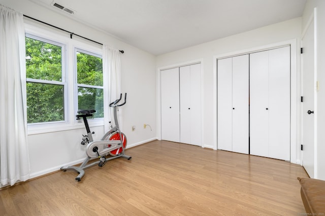 95 Elm St Apt 4, West Haven, CT 06516 - workout area with light wood finished floors and baseboards