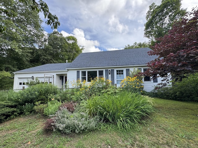 23 Mountain Rd, Mansfield, CT 06250 - view of front facade with a garage, roof with shingles, and a front yard